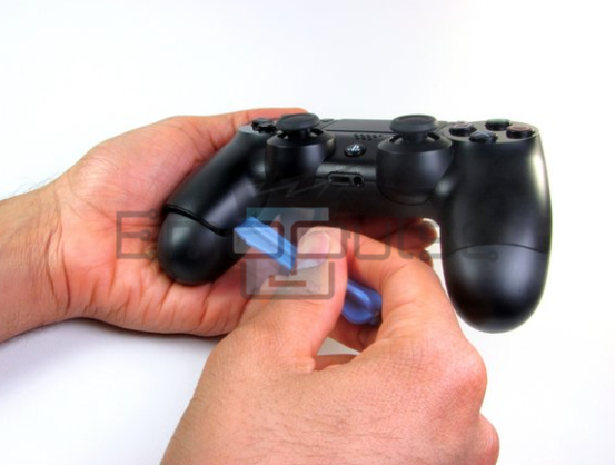 Image showing plate removal of ps4 controller