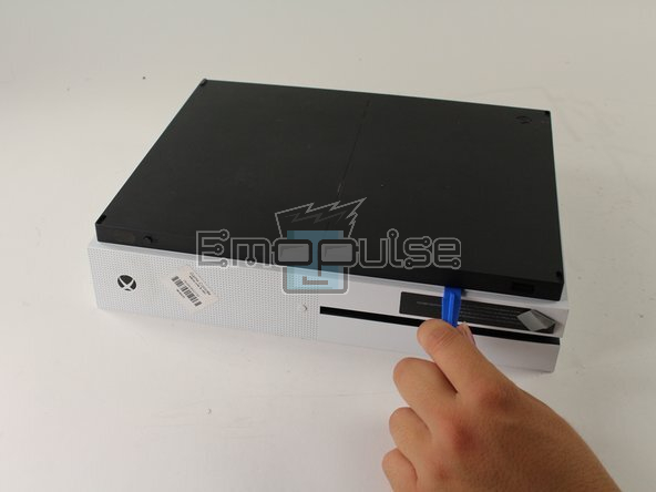 image showing how to open xbox one s using tool 